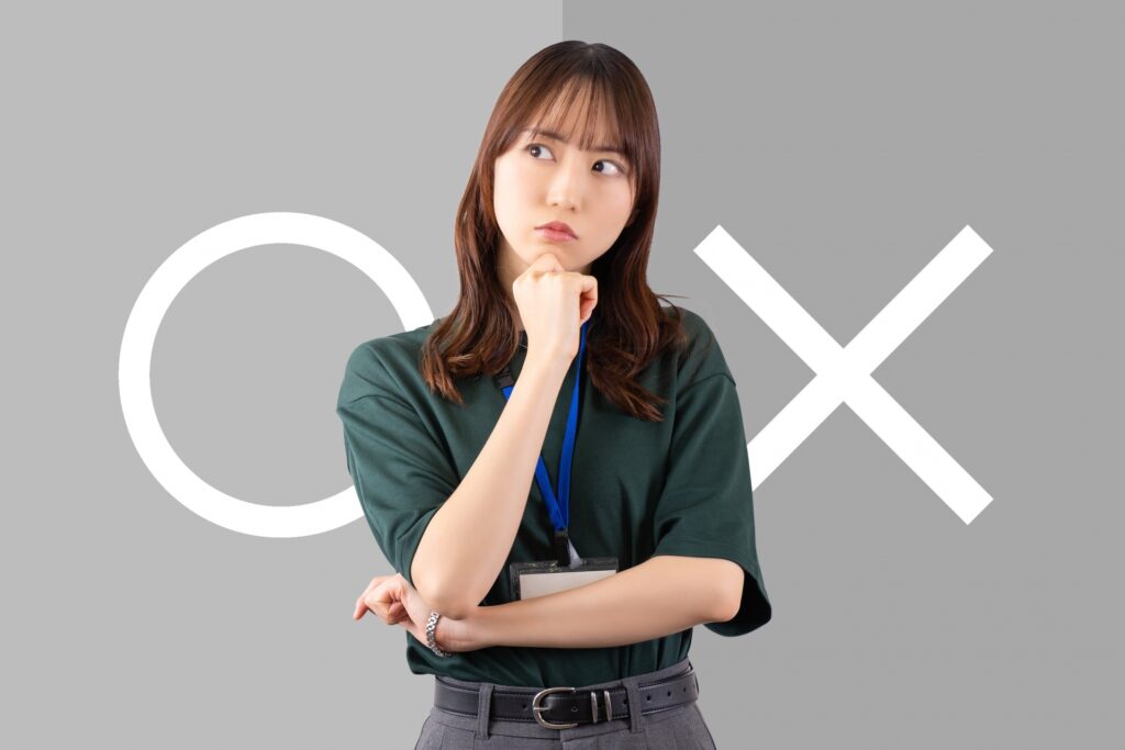 ズル休みをするかどうか迷っている女性